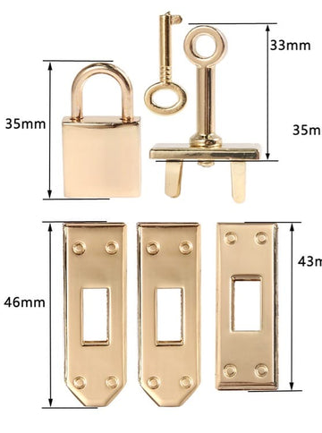 Decorative padlock and key set used mainly for handbags, purses, or small boxes